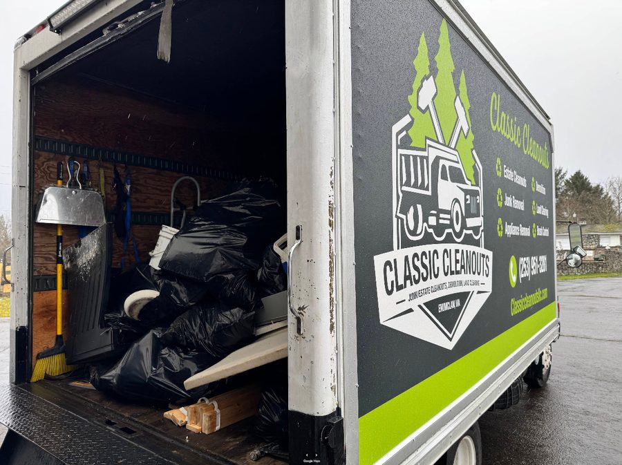 Classic Cleanouts box truck loaded with junk